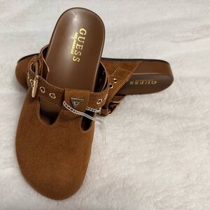 Guess Women's Suede Clogs Brown
Adjustable Buckle Gold Logo Size 6.5 *New*